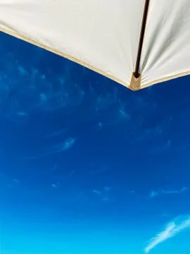 Blue sky with white clouds background. Clear sunny day Stock Photos