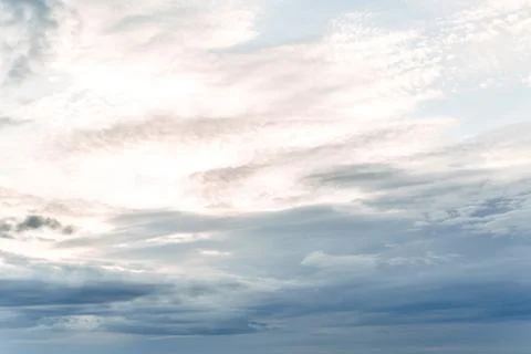 Blue sky with white clouds. Background from the cloudy sky. Stock Photos