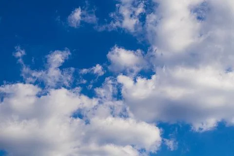 Blue sky with white clouds, . Background with place for text.Photo wallpaper . Stock Photos