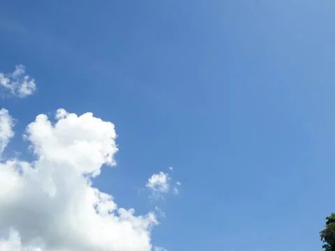 Blue Sky with White Clouds Background on Sunny Day 写真素材