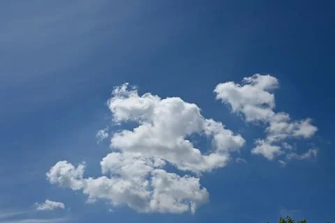 Blue sky with white clouds background Photos