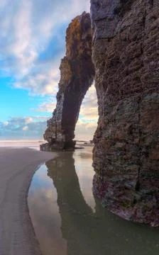 Blue sky with white clouds on the beach of As Catedrais Stock Photos
