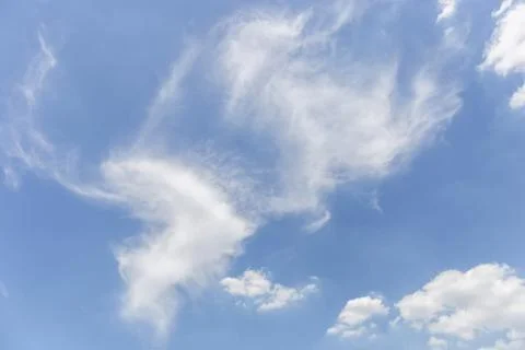 Blue sky with white clouds on a bright day Stockfoto's