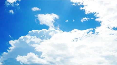 Blue Sky with White Clouds on a Clear Summer Day Stock Footage 336679960