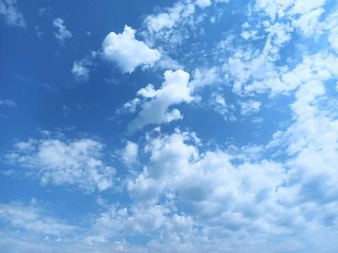 Blue sky with white clouds. Clear sky in the summer. Cloudy landscape Stock Photos