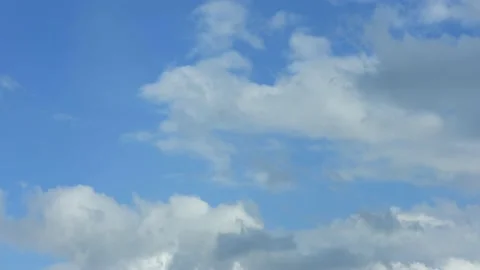 Blue sky white clouds. Cloud time lapse. Puffy fluffy white clouds. Stock Footage 161065493