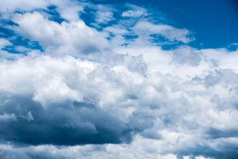 Blue sky with white clouds, cloudscape clear cloudy sky with cumulus clouds. Stock Photos
