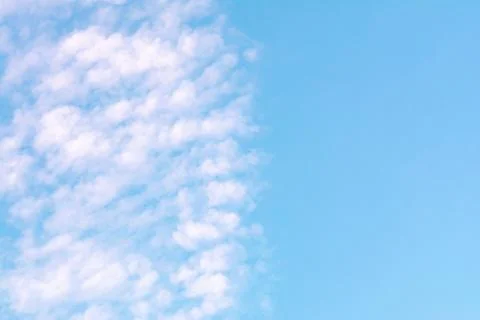 Blue sky with white clouds. Concept landscape, abstraction. Stock Photos