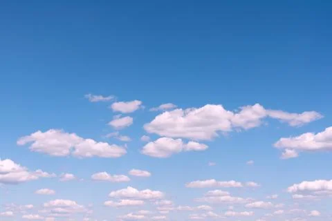 Blue sky with white clouds. Concept landscape, abstraction. Stock Photos