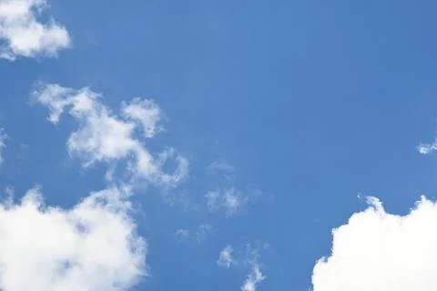 Blue Sky with White Clouds, Copy Space Background Stockfoto's