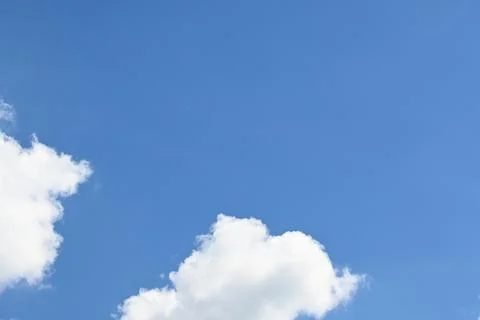 Blue Sky with White Clouds, Copy Space Background Stockfoto's