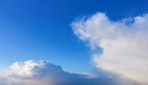 Blue sky with white clouds in daylight. Stock Photos