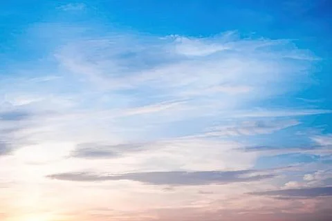 Blue sky with white clouds in the evening Stock Photos