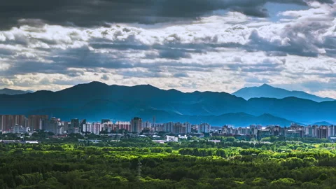 Blue sky, white clouds, green city, fresh air Stock Footage 283865924
