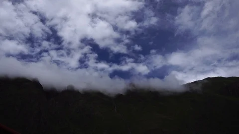 Blue Sky White Clouds Over Mountains [Timelapse] Stock Footage 88390657