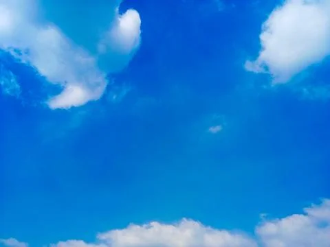 Blue sky with white clouds. Stock Photos
