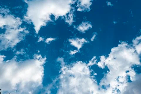 Blue sky with white clouds Stock Photos