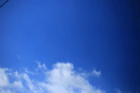 Blue sky with white clouds. Stock Photos