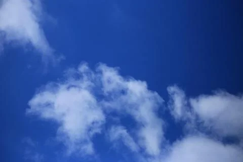 Blue sky with white clouds. Stock Photos