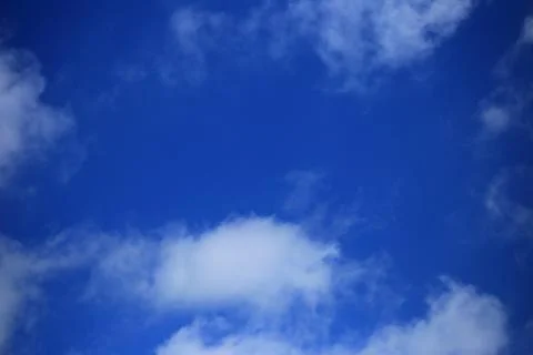 Blue sky with white clouds. Stock Photos