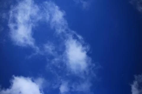 Blue sky with white clouds. Stock Photos
