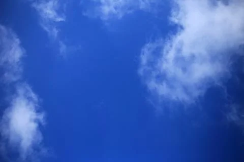 Blue sky with white clouds. Stock Photos
