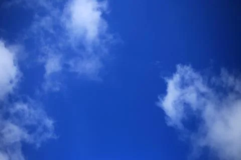 Blue sky with white clouds. Stock Photos