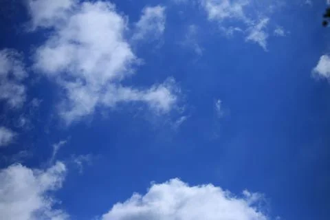 Blue sky with white clouds. Stock Photos