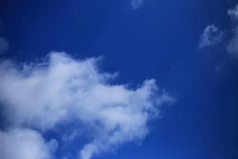 Blue sky with white clouds. Stock Photos