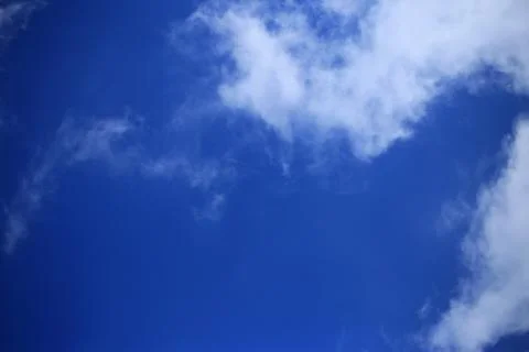 Blue sky with white clouds. Stock Photos