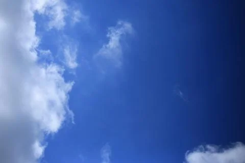 Blue sky with white clouds. Stock Photos