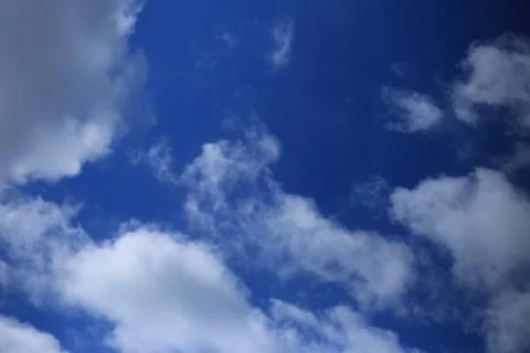 Blue sky with white clouds. Stock Photos
