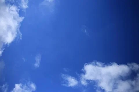 Blue sky with white clouds. Stock Photos