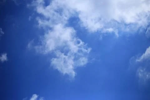 Blue sky with white clouds. Stock Photos
