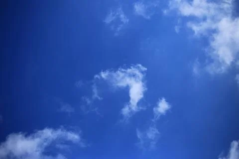 Blue sky with white clouds. Stock Photos