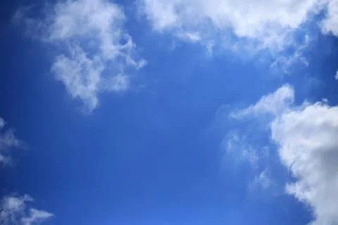 Blue sky with white clouds. Stock Photos