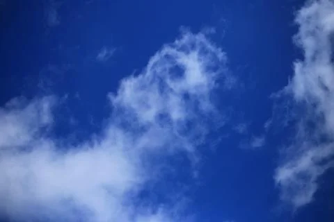 Blue sky with white clouds. Stock Photos