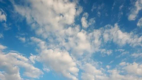 Blue sky with white clouds. Stock Photos