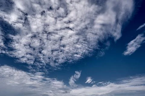 Blue sky in white clouds Stock Photos