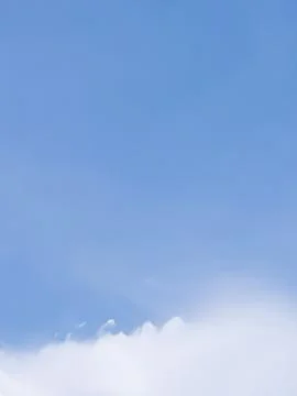 Blue Sky with White Clouds Stock Photos