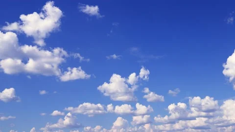 Blue sky white clouds. Puffy fluffy white clouds. Cumulus cloud scape timelapse Stock Footage 136458322
