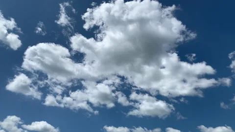 Blue sky white clouds. Puffy fluffy white clouds. Stock Footage 140943262