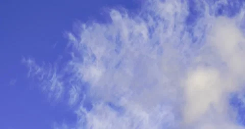 Blue sky white clouds. Puffy fluffy white clouds. Cumulus cloud cloudscape ti 스톡 동영상 145142522