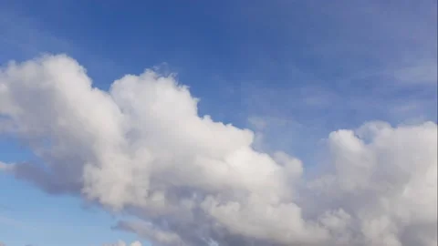 Blue sky white clouds. Puffy fluffy white clouds. Cumulus cloud scape timelapse Stock Footage 145717351