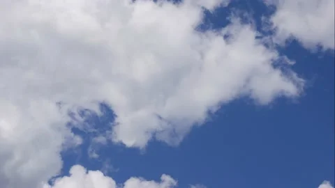 Blue sky white clouds. Puffy fluffy white clouds. Cumulus cloud scape timelapse Stock Footage 158855818