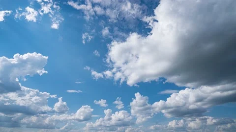 Blue sky white clouds. Puffy fluffy white clouds. Cumulus cloud cloudscape Stock Footage 160541267