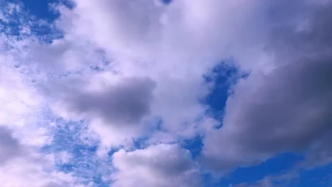 Blue sky white clouds. Puffy fluffy white clouds. Stock Footage
