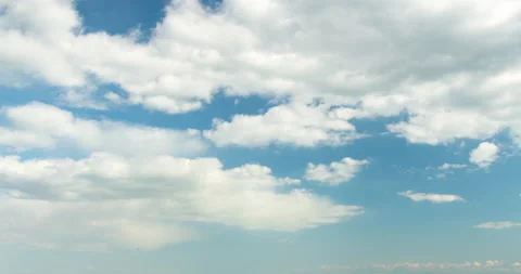 Blue sky white clouds. Puffy fluffy white clouds. Cumulus cloud scape timelapse Stock Footage 167176679