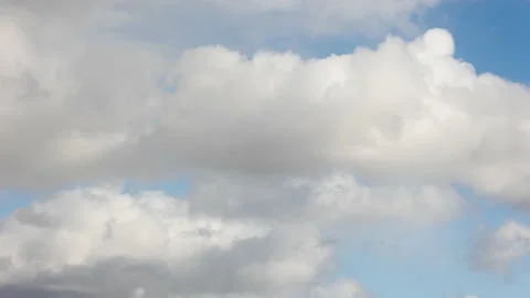 Blue sky white clouds. Puffy fluffy white clouds. Stock Footage 168578088