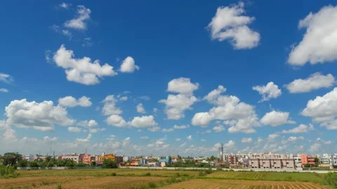 Blue sky white clouds. Puffy fluffy white clouds. Cumulus cloud scape timelapse. Stock Footage 171257236